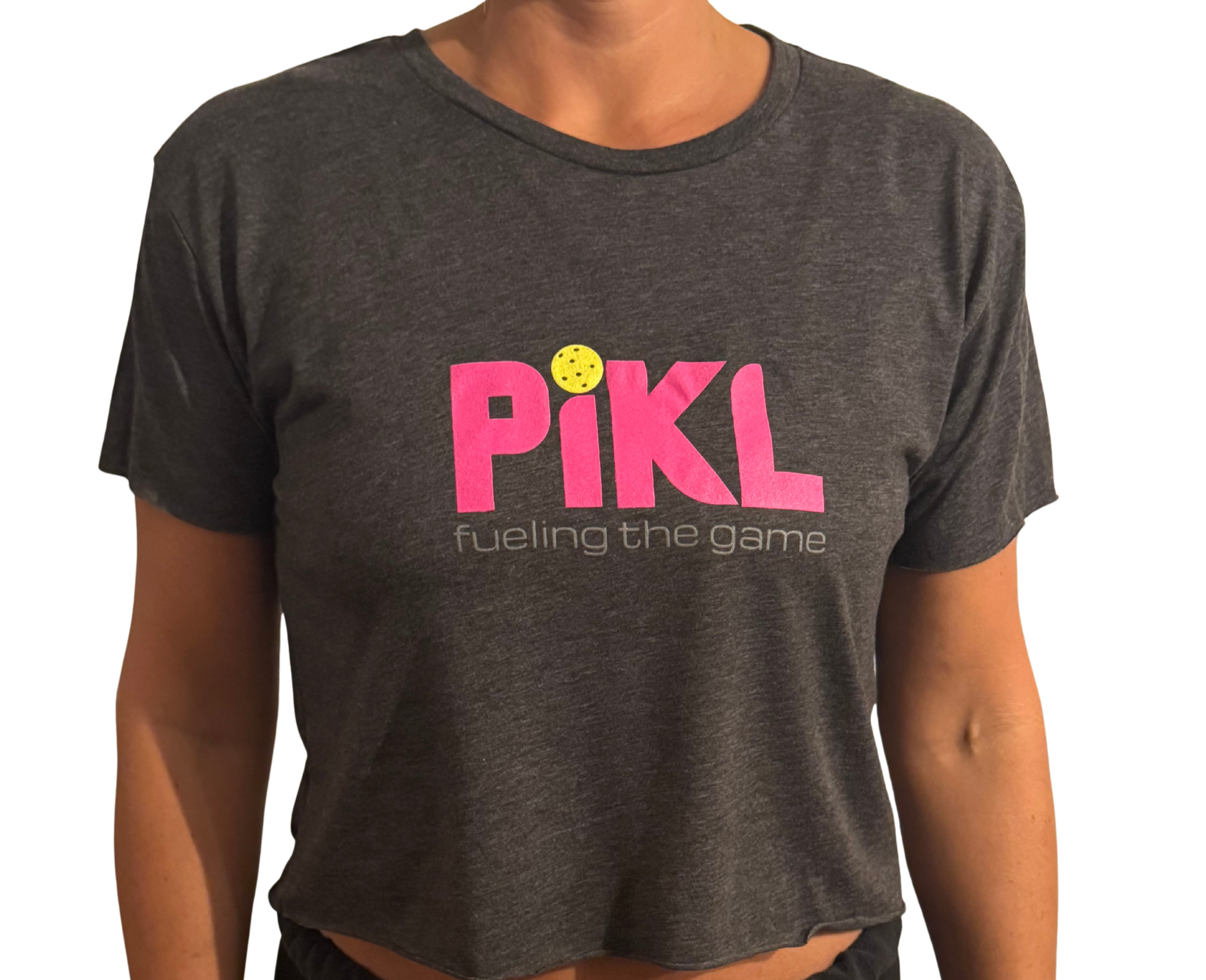 Person wearing a dark gray t-shirt with 'Pikl' logo and text on a white background